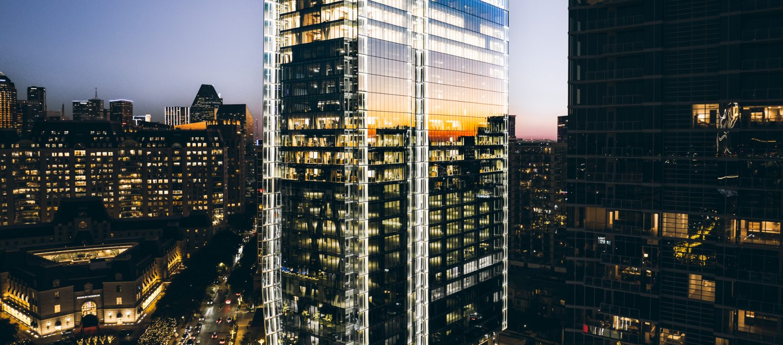 Exterior night time drone view of the 23 springs office building